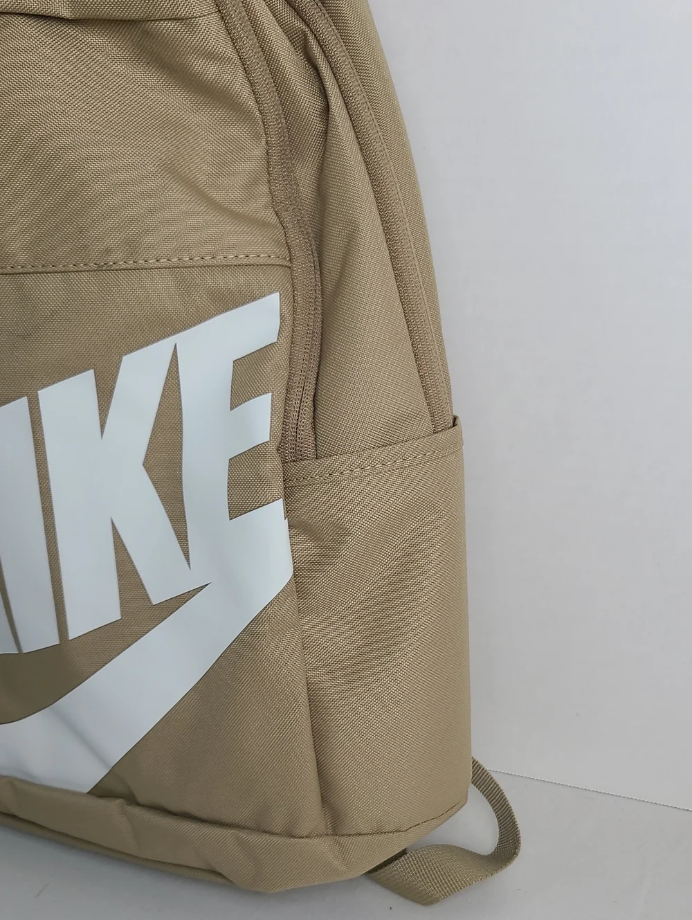 NWT NIKE Mulriple Zip Compartment Pockets Backpack Tan Beige with White Logo